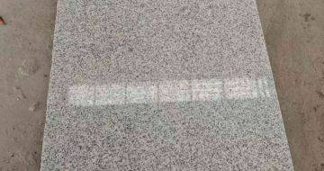 双鸭山芝麻白光面毛板