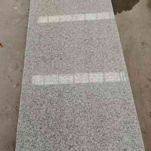 双鸭山芝麻白光面毛板